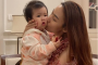 Biểu cảm cực yêu của con gái Lê Phương khi được Ngân Khánh hôn